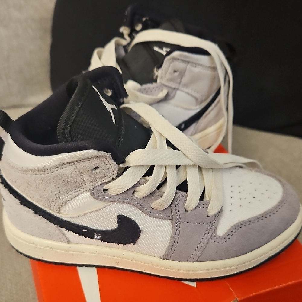 Jordan Black and White High-Top Sneakers